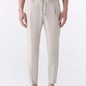 Pantalone jogger spigato con elastico in vita